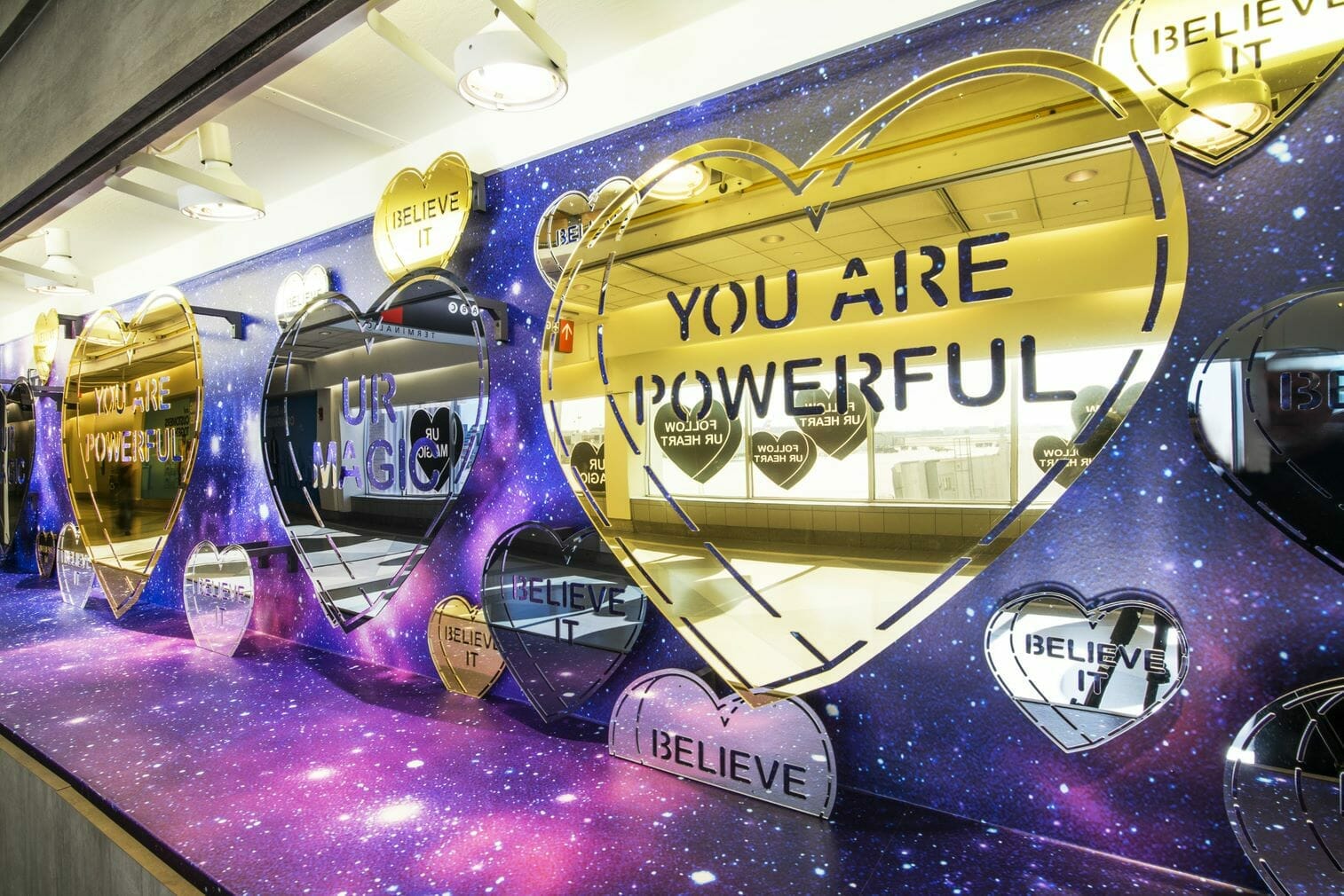 Follow UR Heart, 2019 by Amberella in Terminal C-D connector of Philadelphia International Airport. Photograph courtesy of Philadelphia International Airport.