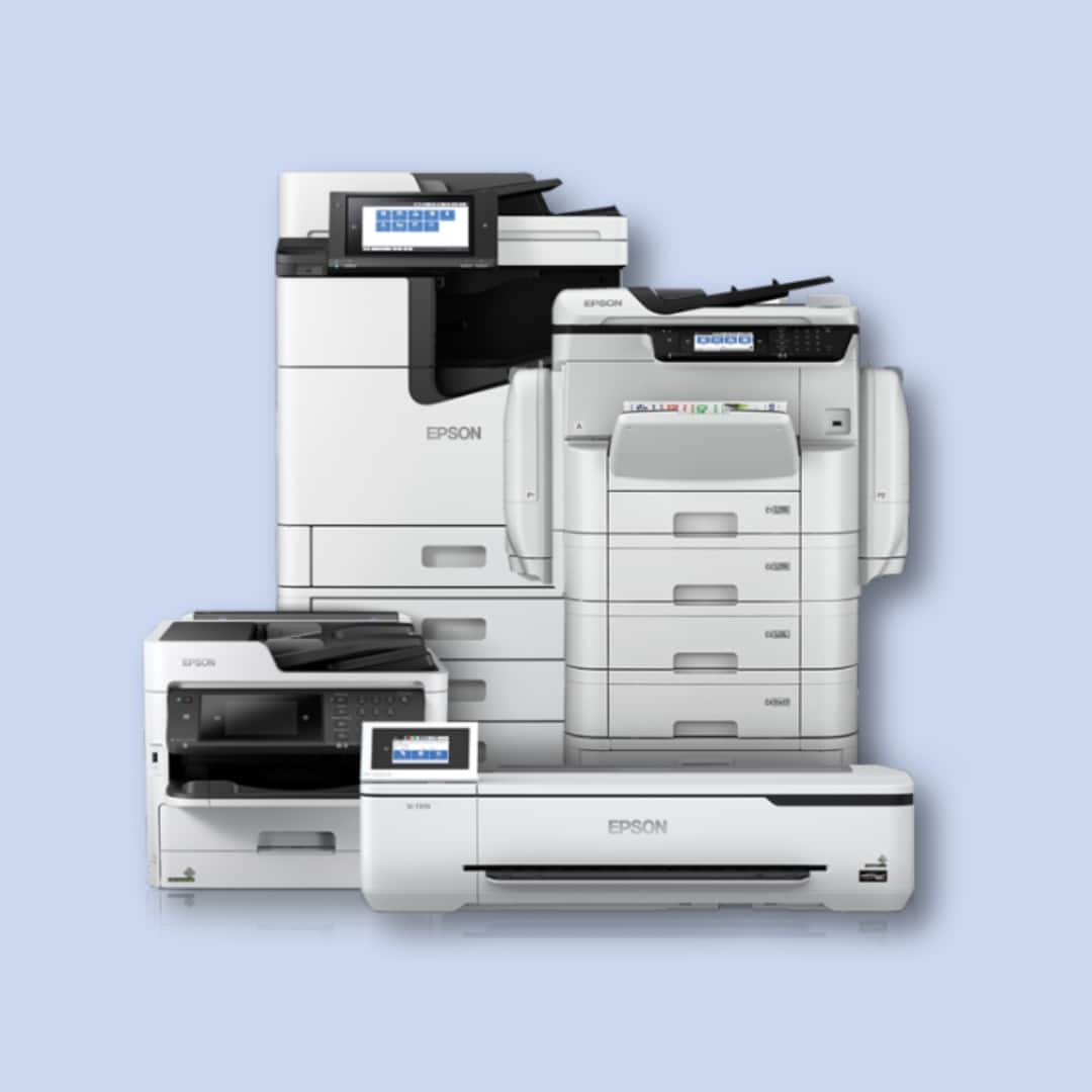 Four Epson office printers and copiers of varying sizes and models are arranged in front of a light blue background.