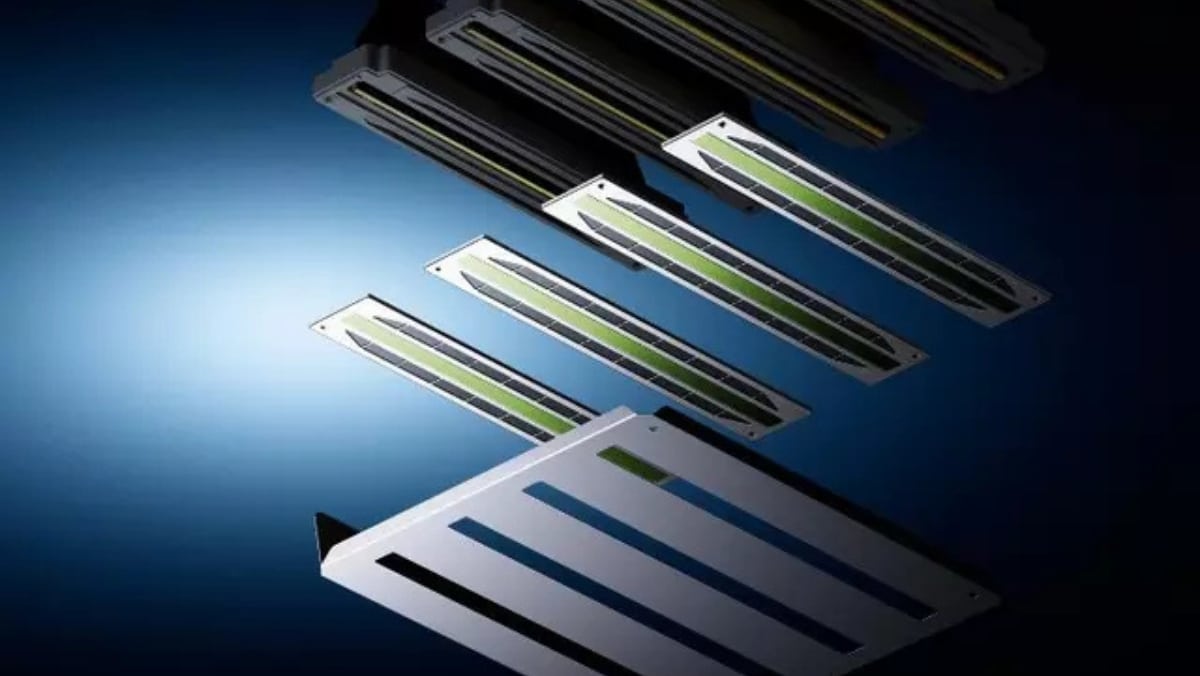 Epson Precisioncore Several rectangular printhead components with green circuitry are arranged in a staggered pattern on a blue gradient background.