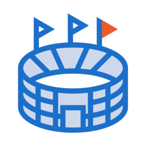 Simple illustration of a blue stadium with three flags on top, two blue and one orange, set against a plain light background.